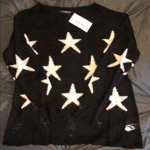Women’s Black Sweater w/ Stars on it.